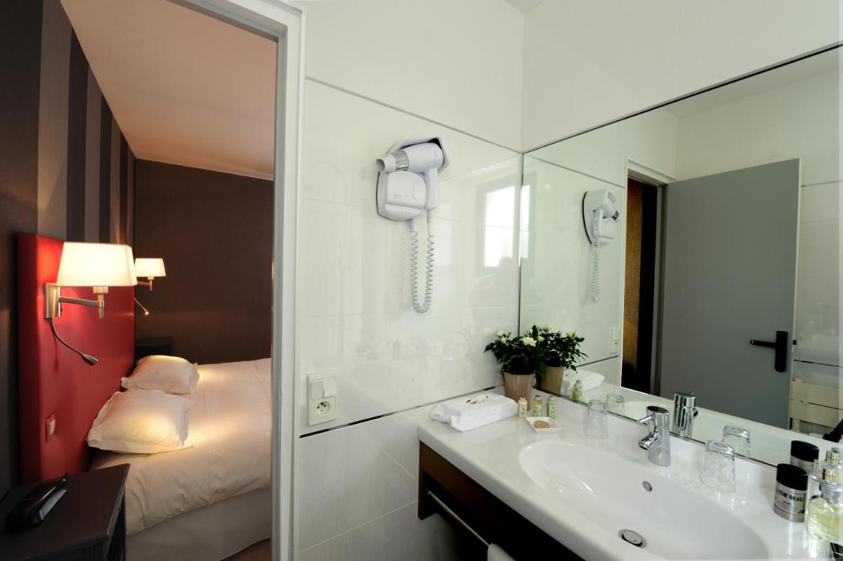Salle de bains dans l'établissement Hôtel Lutétia & Spa