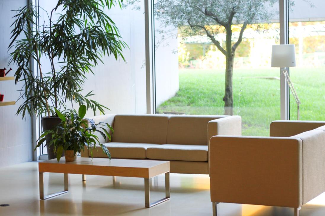 Uma área de estar em INLIMA Hotel & Spa
