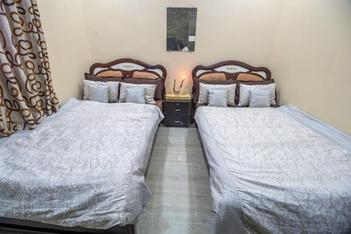 OSI Apartments Sahar Andheri East - Housity