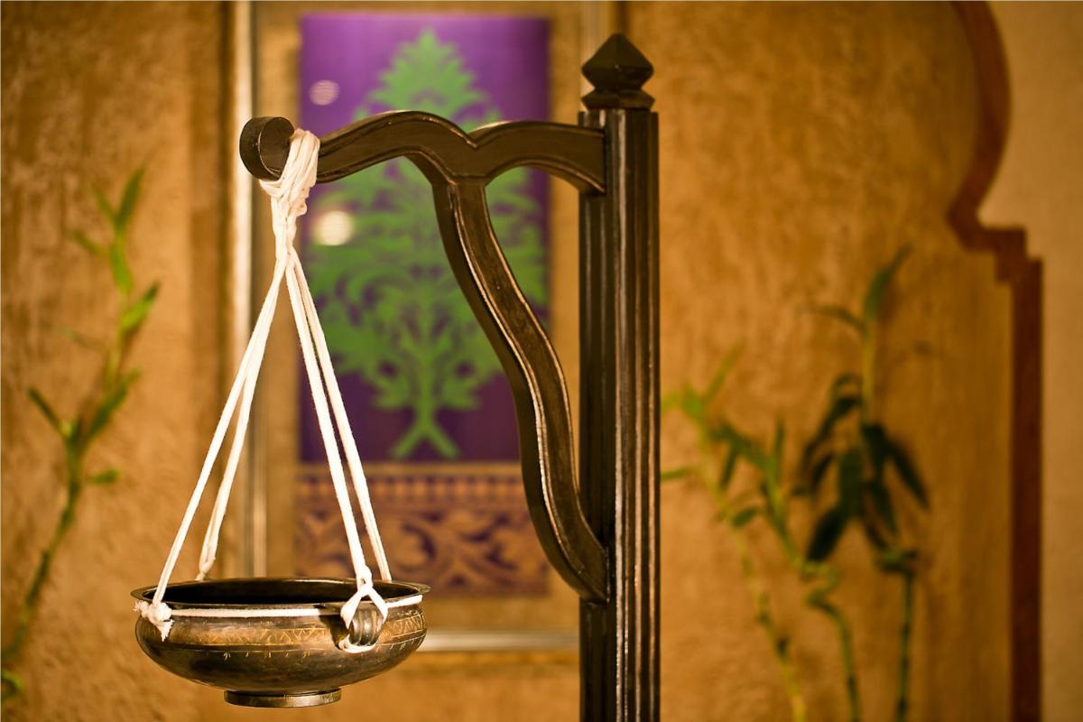 a scale in front of a mirror at The Lalit Jaipur in Jaipur