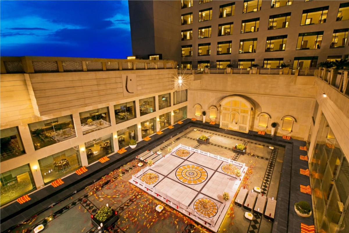 an overhead view of a building with a pool at The Lalit Jaipur in Jaipur