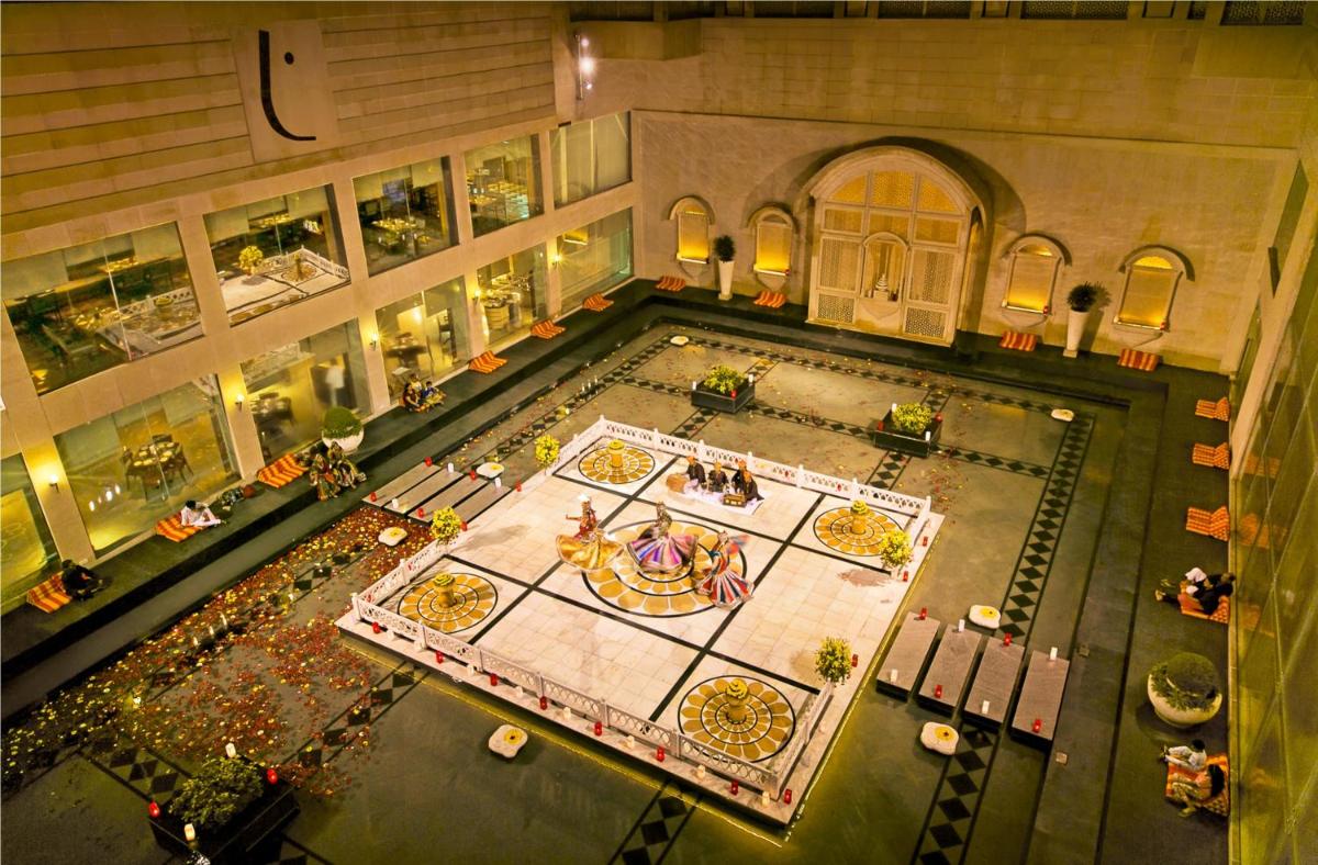 an overhead view of a pool in a building at The Lalit Jaipur in Jaipur