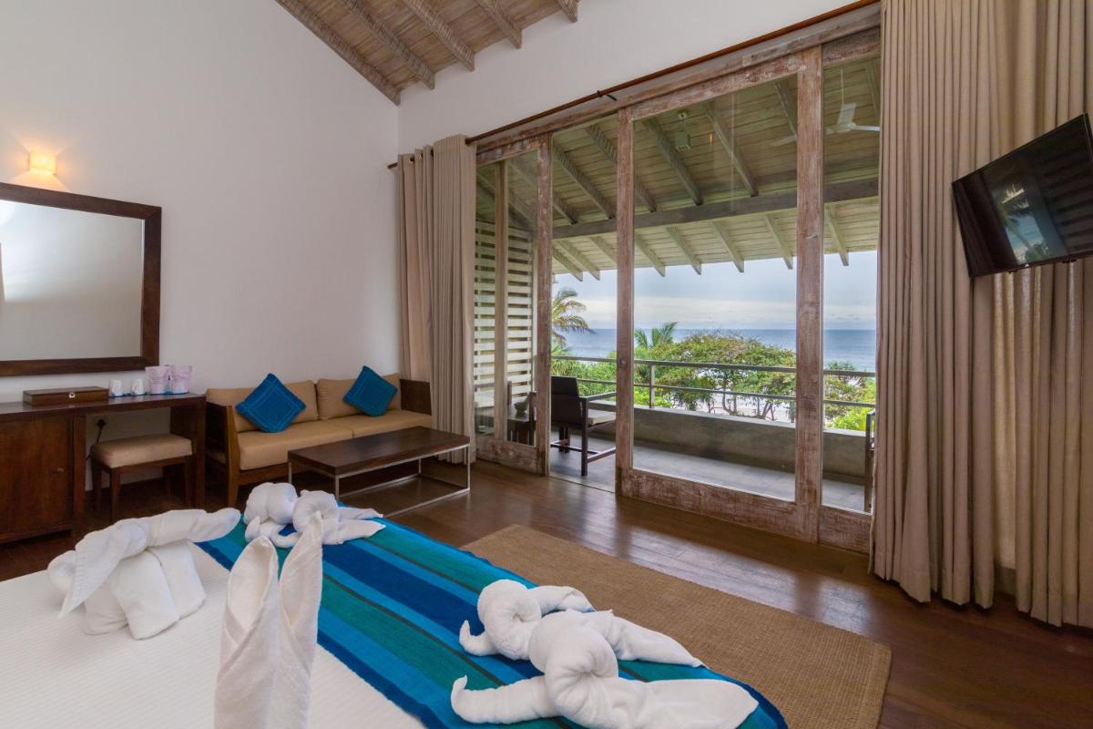 Roman Beach Hotel - Housity