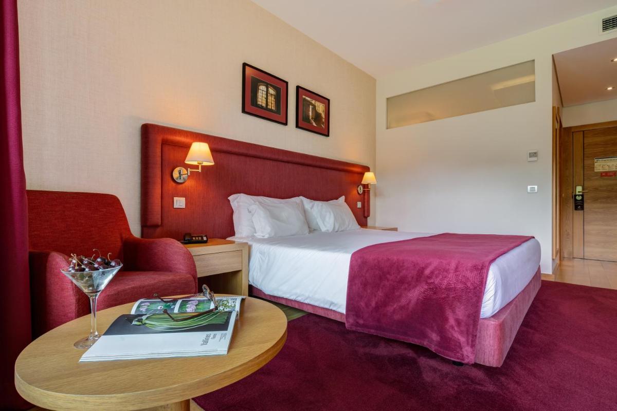 Uma cama ou camas num quarto em Hotel Rural Vale Do Rio