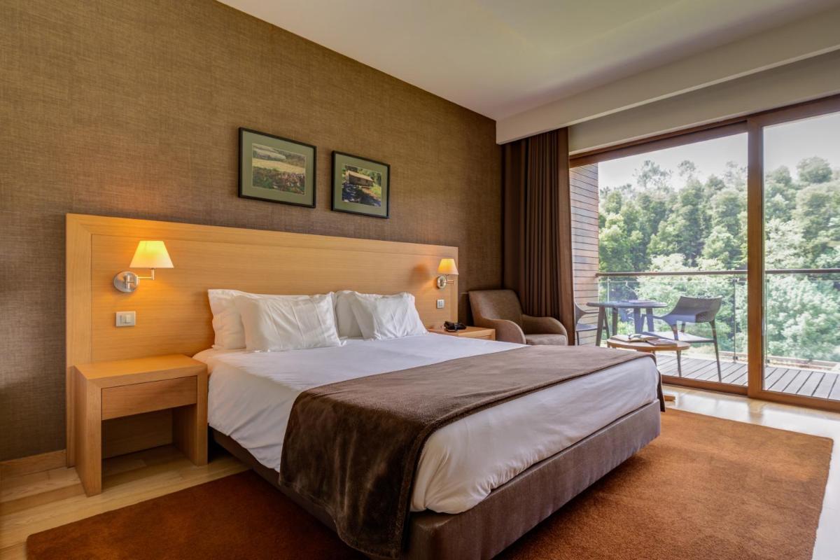 Uma cama ou camas num quarto em Hotel Rural Vale Do Rio
