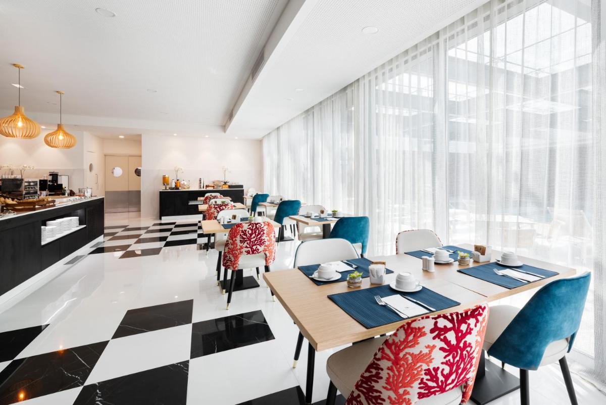 Um restaurante ou outro lugar para comer em Eurostars Matosinhos