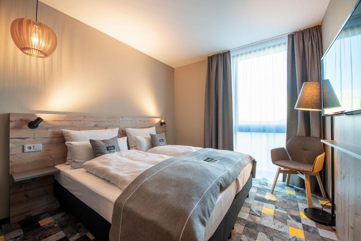 Holiday Inn - the niu, Timber Esslingen by IHG - Housity