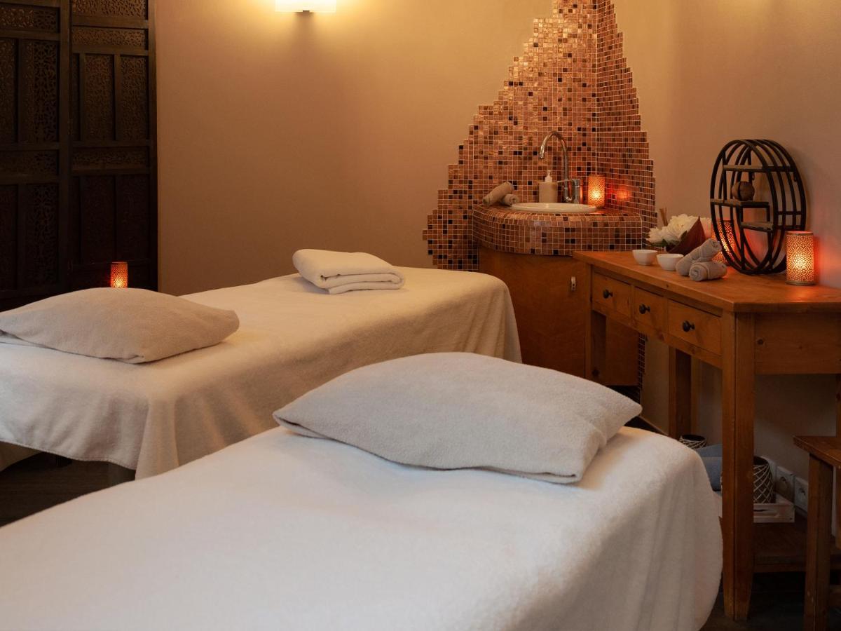 Un ou plusieurs lits dans un hébergement de l'établissement Hotel Restaurant & Spa Verte Vallée