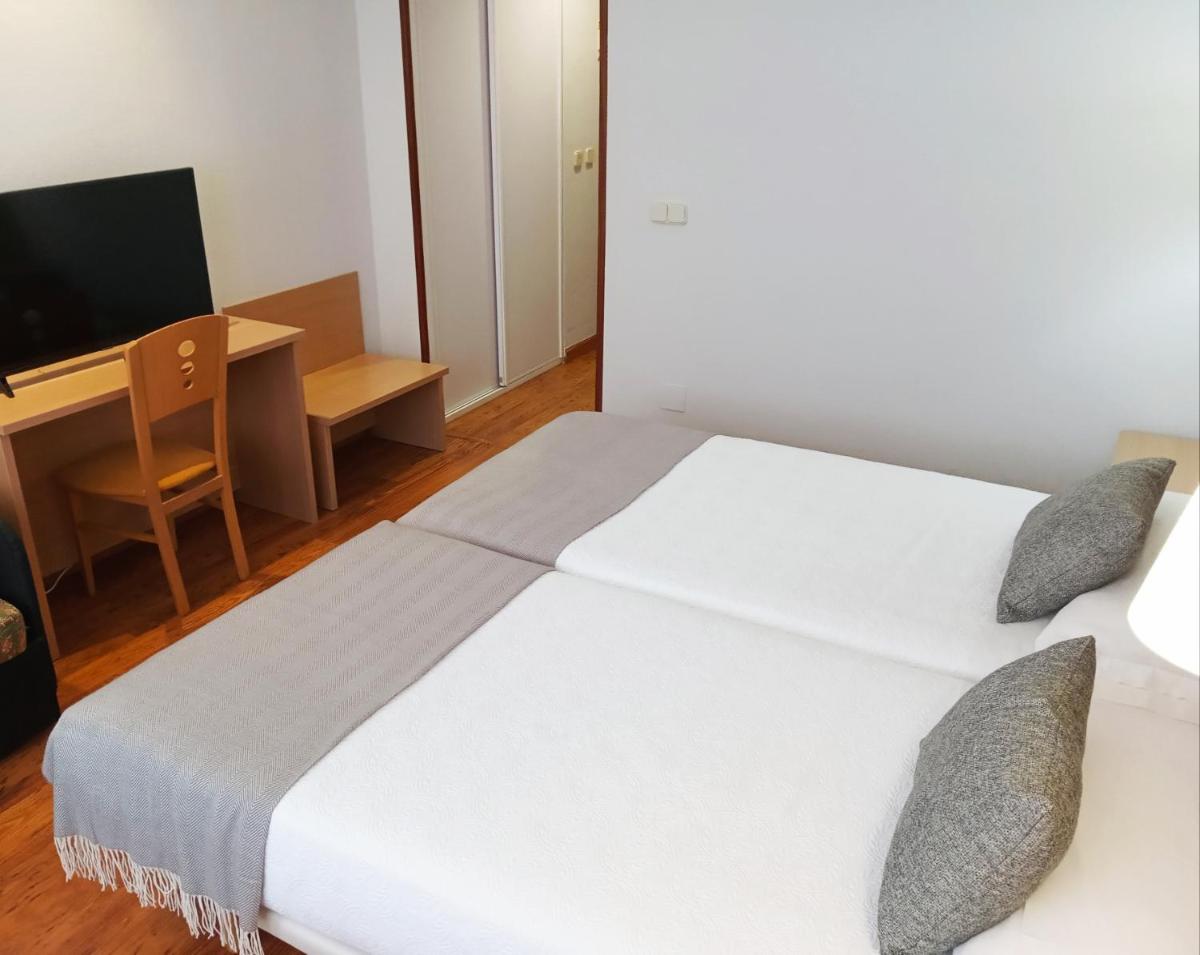 Cama o camas de una habitación en Hotel San Millán