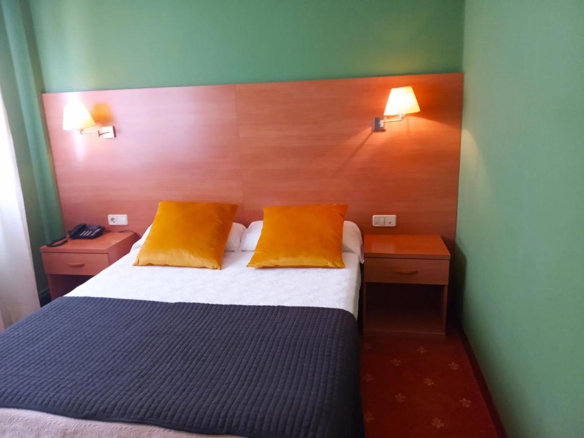 Cama o camas de una habitación en Hotel San Millán
