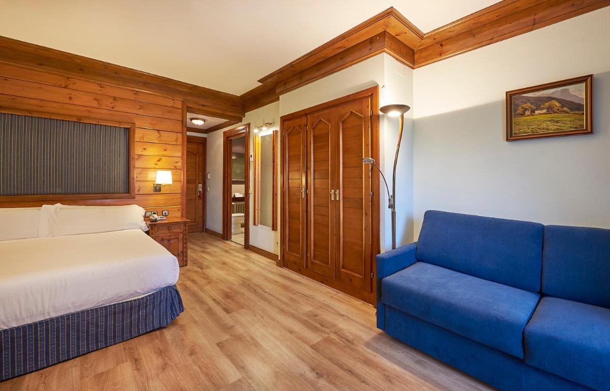 Cama o camas de una habitación en Hotel Grèvol Spa
