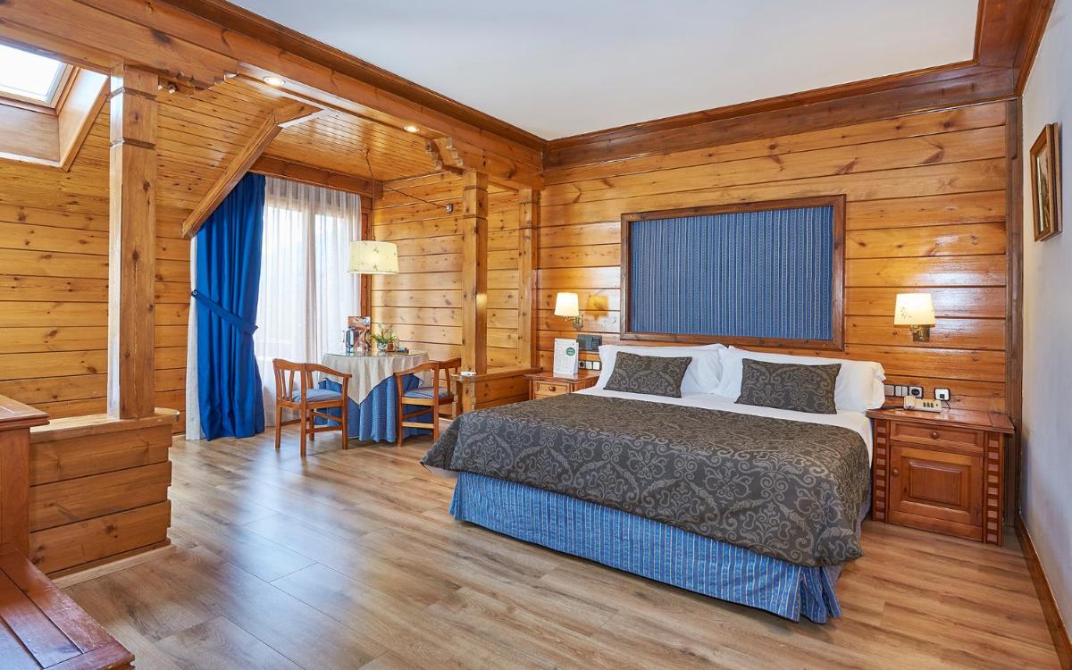 Cama o camas de una habitación en Hotel Grèvol Spa