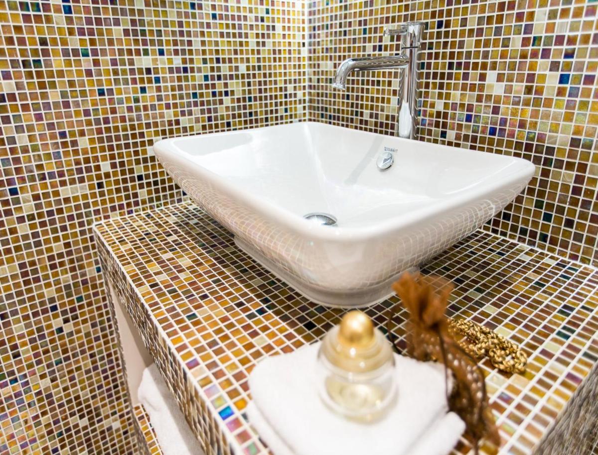 Salle de bains dans l'établissement Hôtel Spa Marotte