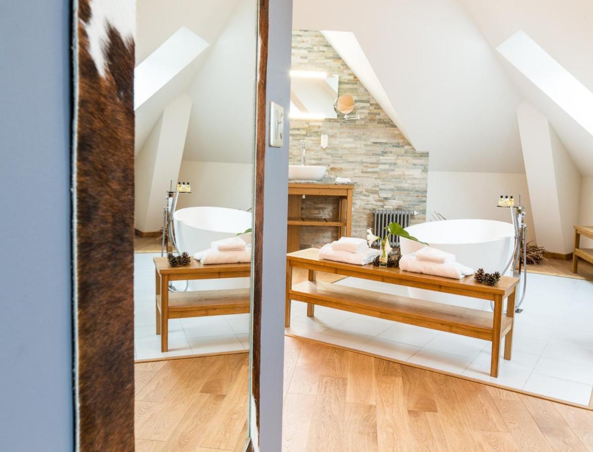 Salle de bains dans l'établissement Hôtel Spa Marotte