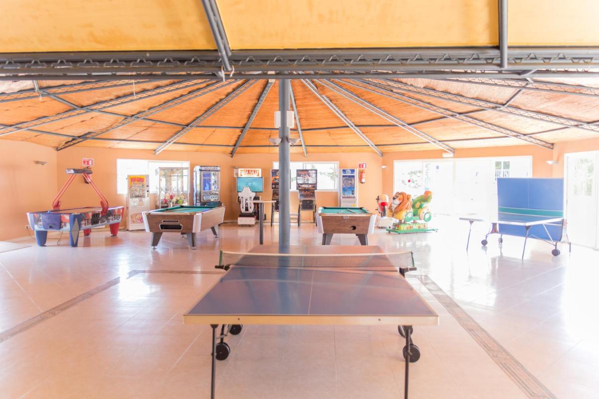 Zona de estar de Hotel Club Es Talaial