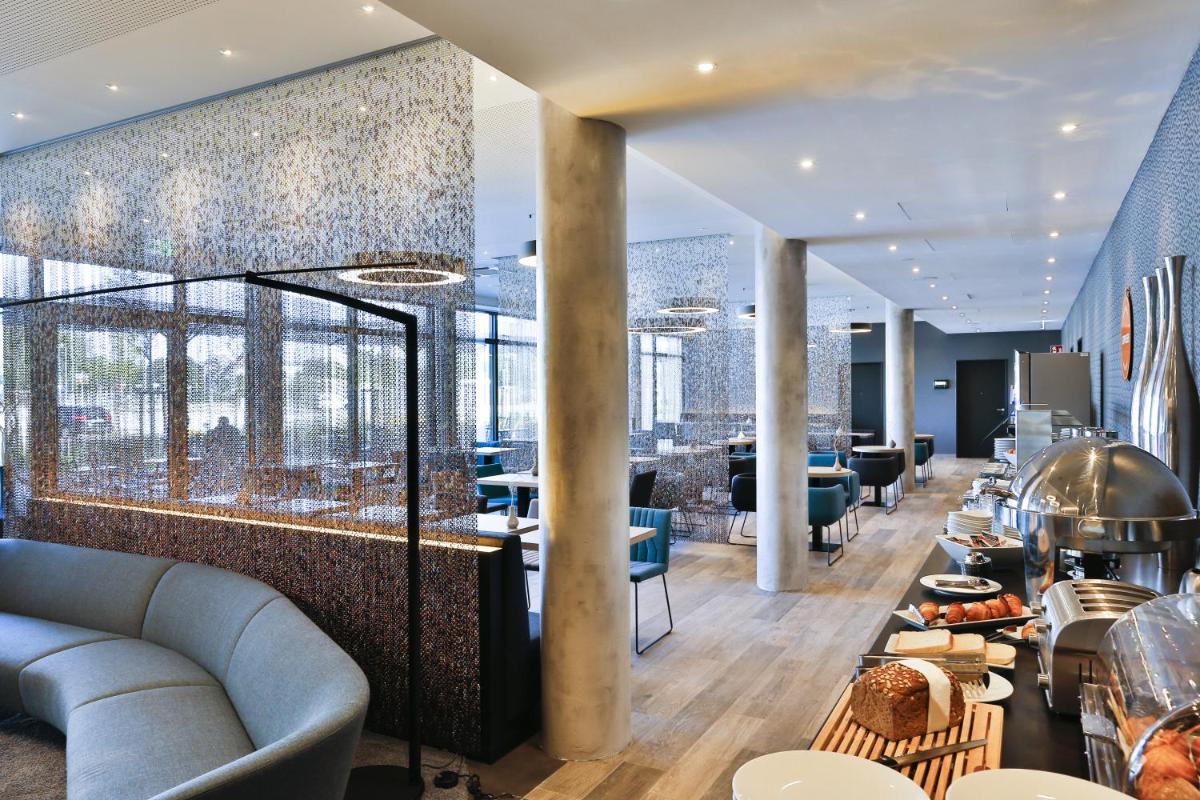 Holiday Inn Express Karlsruhe - City Park by IHG - Housity