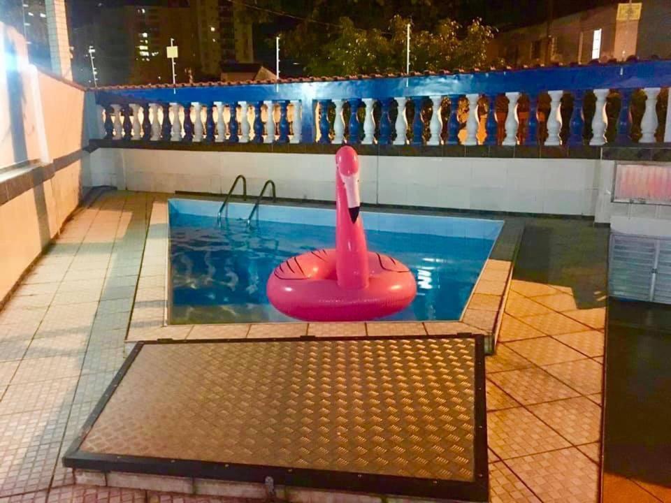 Casa Guilhermina com Piscina e Churrasqueira - Housity