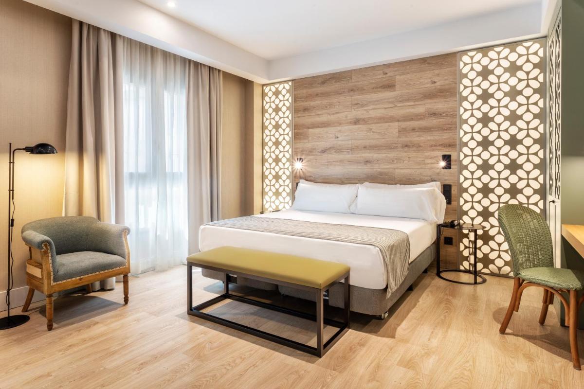 Cama o camas de una habitación en Catalonia Santa Justa