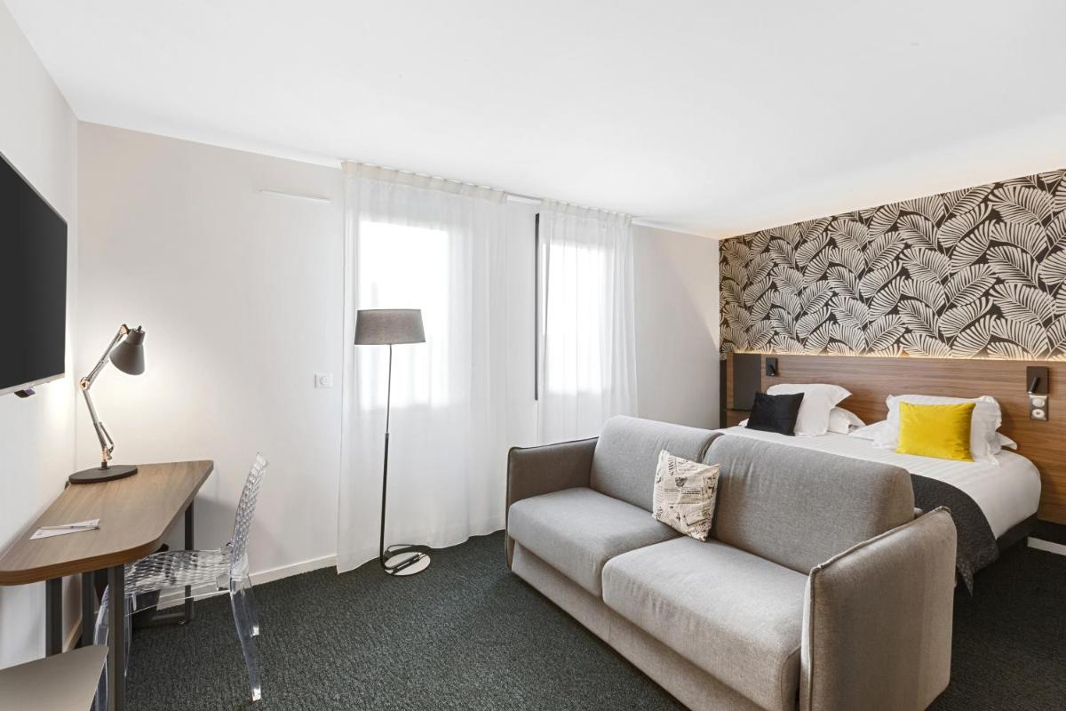 Coin salon dans l'établissement Best Western Plus Europe Hôtel Brest