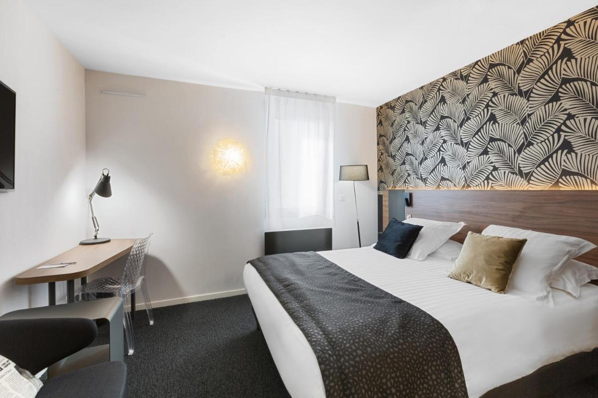 Un ou plusieurs lits dans un hébergement de l'établissement Best Western Plus Europe Hôtel Brest