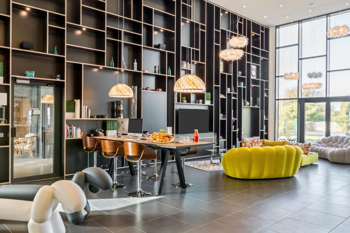 Coin salon dans l'établissement Best Western Plus Europe Hôtel Brest
