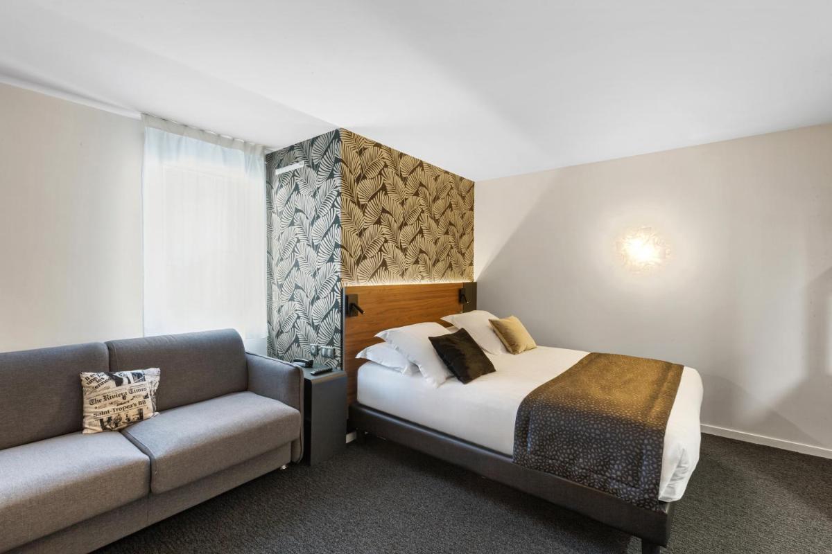 Un ou plusieurs lits dans un hébergement de l'établissement Best Western Plus Europe Hôtel Brest