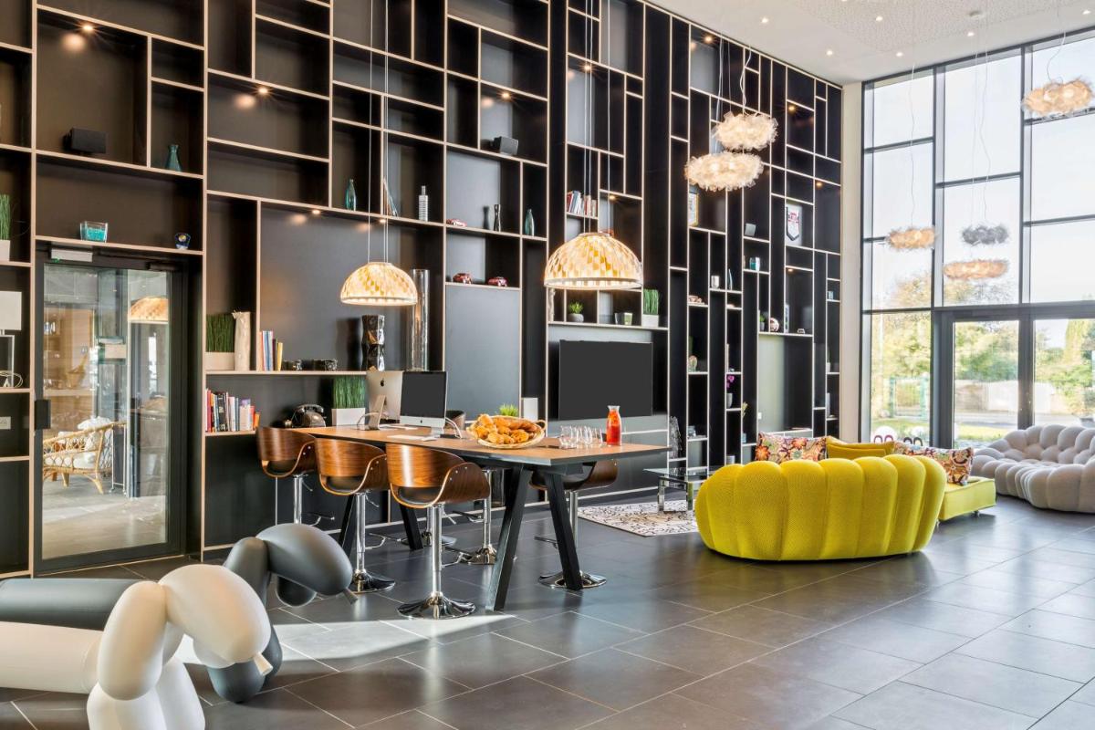 Coin salon dans l'établissement Best Western Plus Europe Hôtel Brest