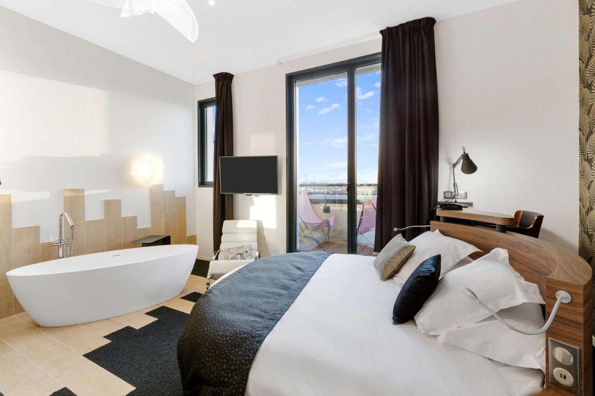 Un ou plusieurs lits dans un hébergement de l'établissement Best Western Plus Europe Hôtel Brest