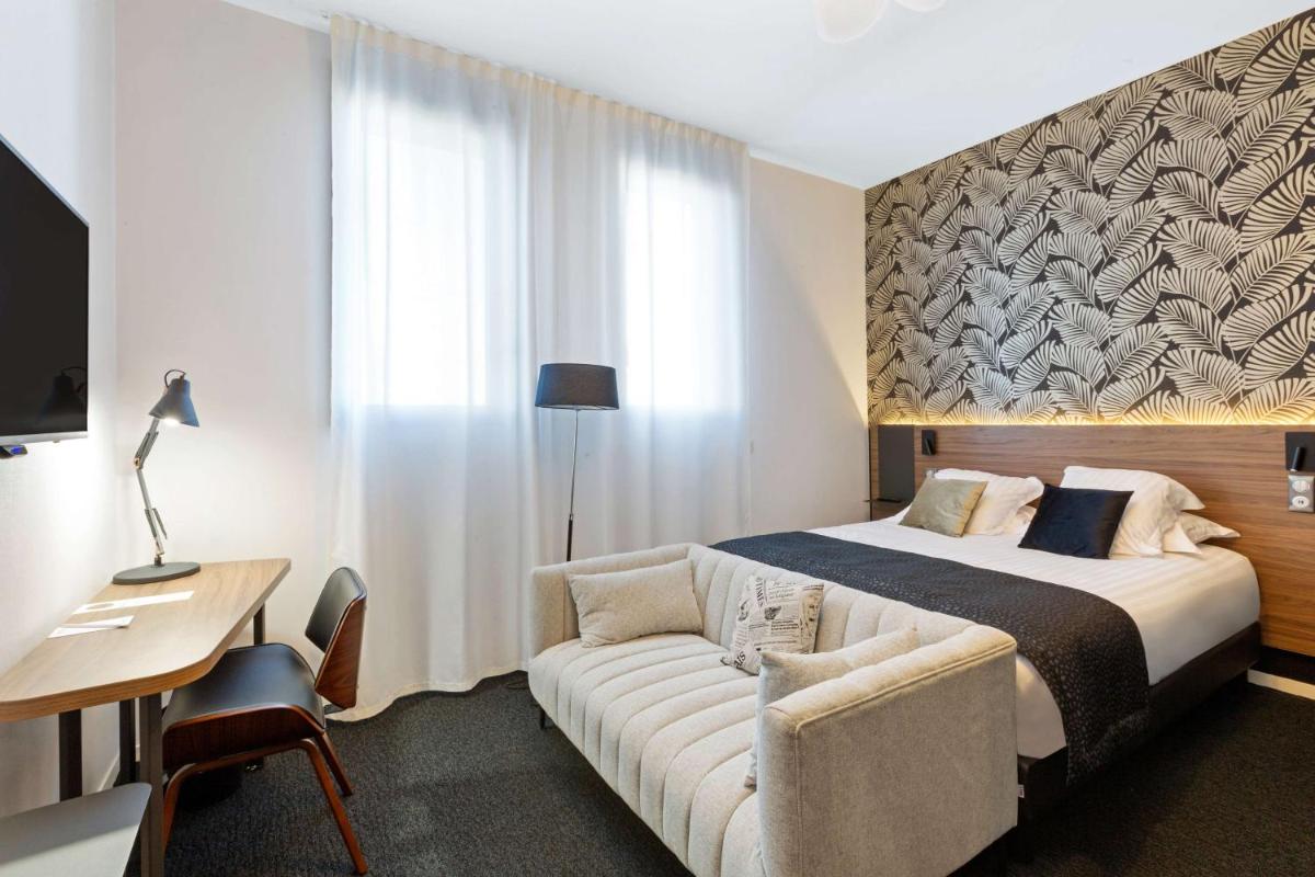 Un ou plusieurs lits dans un hébergement de l'établissement Best Western Plus Europe Hôtel Brest