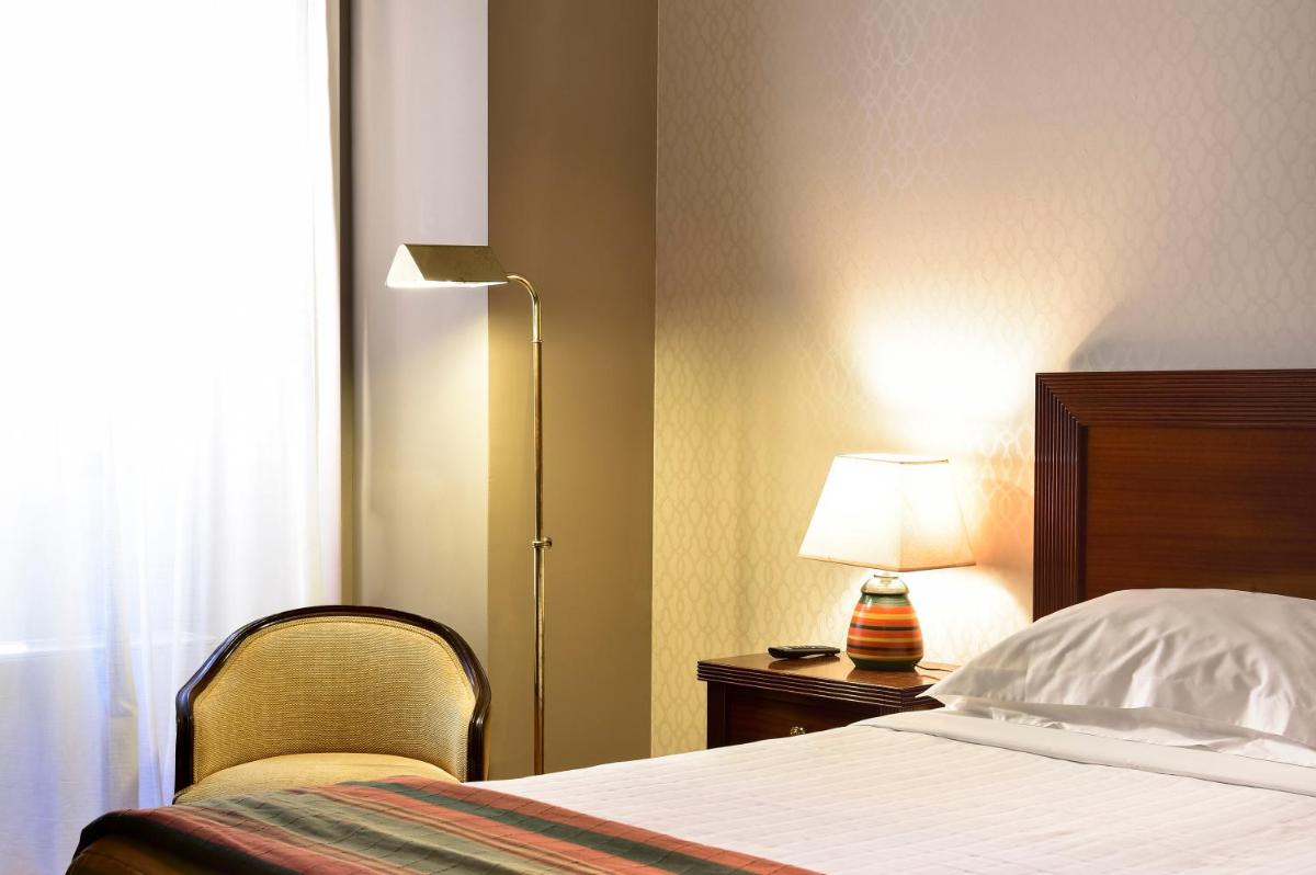 Uma cama ou camas num quarto em Central Monchique Hotel - Villa Termal Spa Resort - by Unlock Hotels