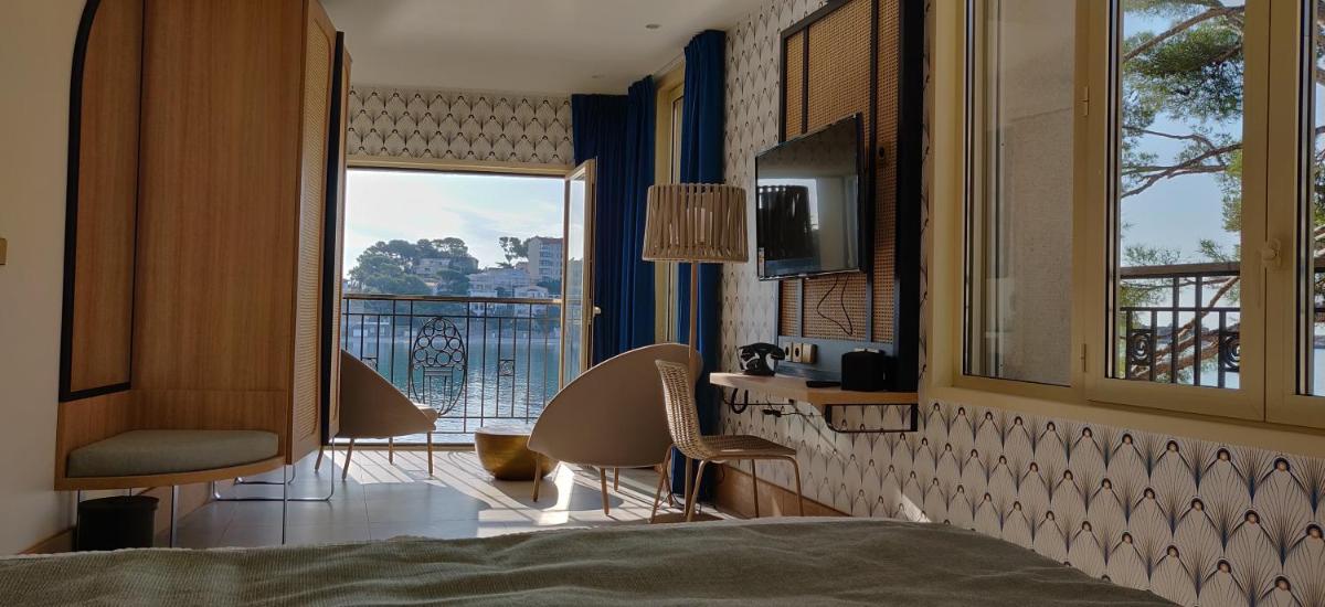 Un ou plusieurs lits dans un hébergement de l'établissement Splendid Hôtel & Spa