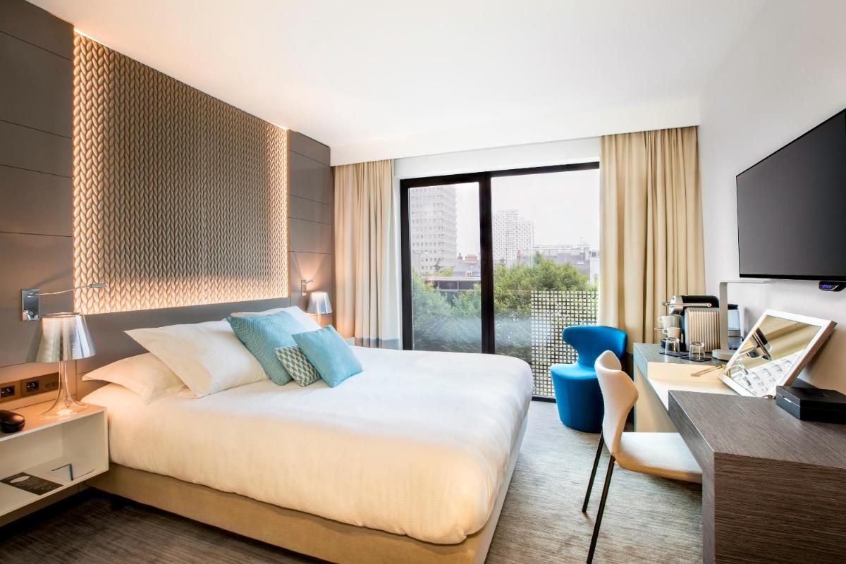Un ou plusieurs lits dans un hébergement de l'établissement BW Premier Collection Le Saint Antoine Hotel et Spa