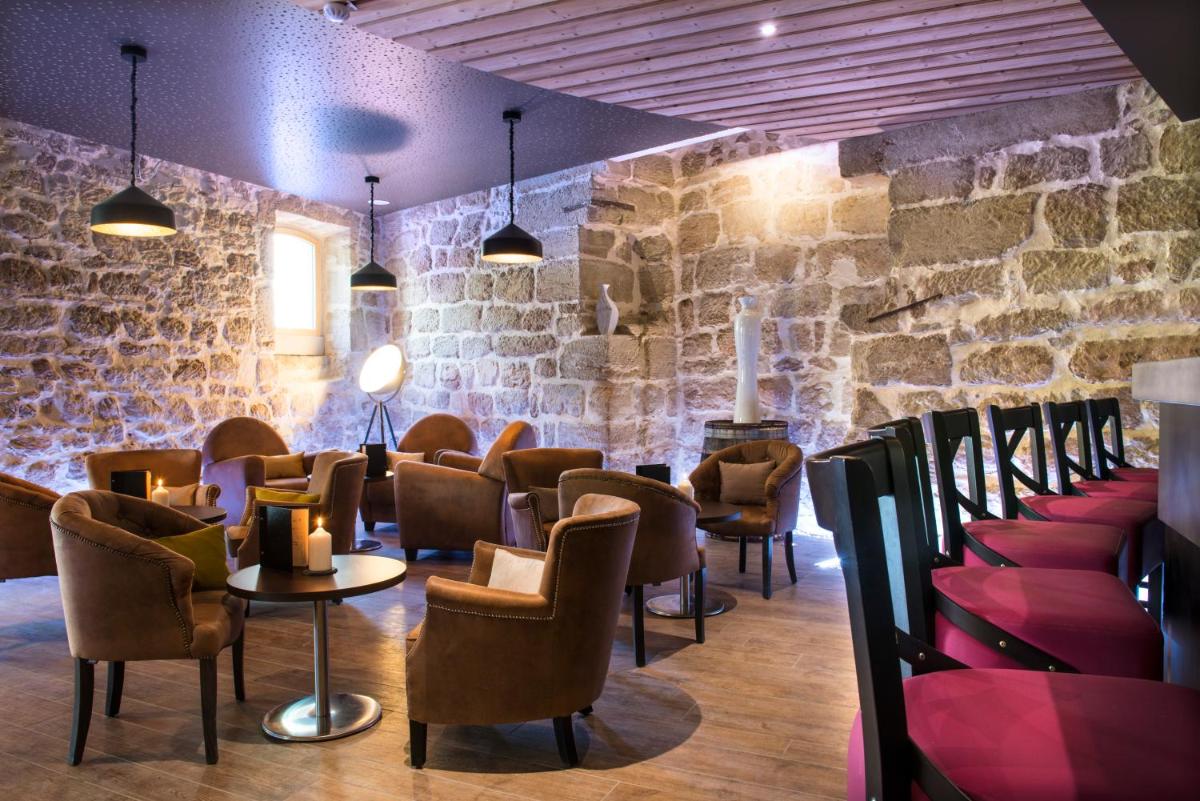 Coin salon dans l'établissement Château De Massillan
