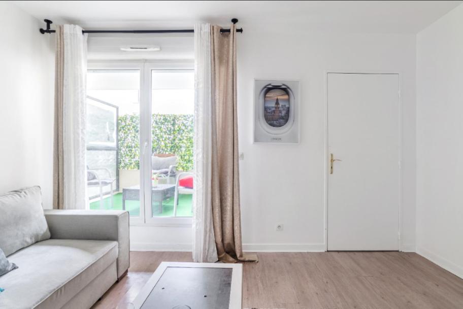 Appartement spacieux avec terrasse près de Paris et du Stade de France - Housity