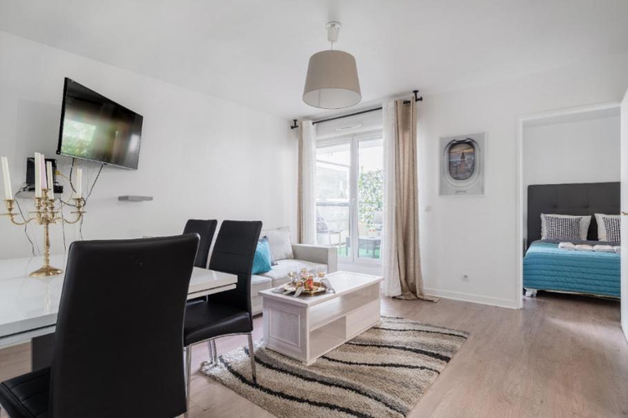 Appartement spacieux avec terrasse près de Paris et du Stade de France - Housity