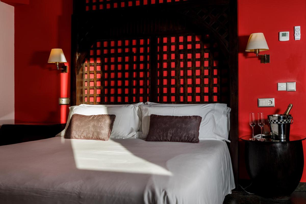 Cama o camas de una habitación en Eco Hotel Boutique & Spa Capitulo Trece - Adults Only