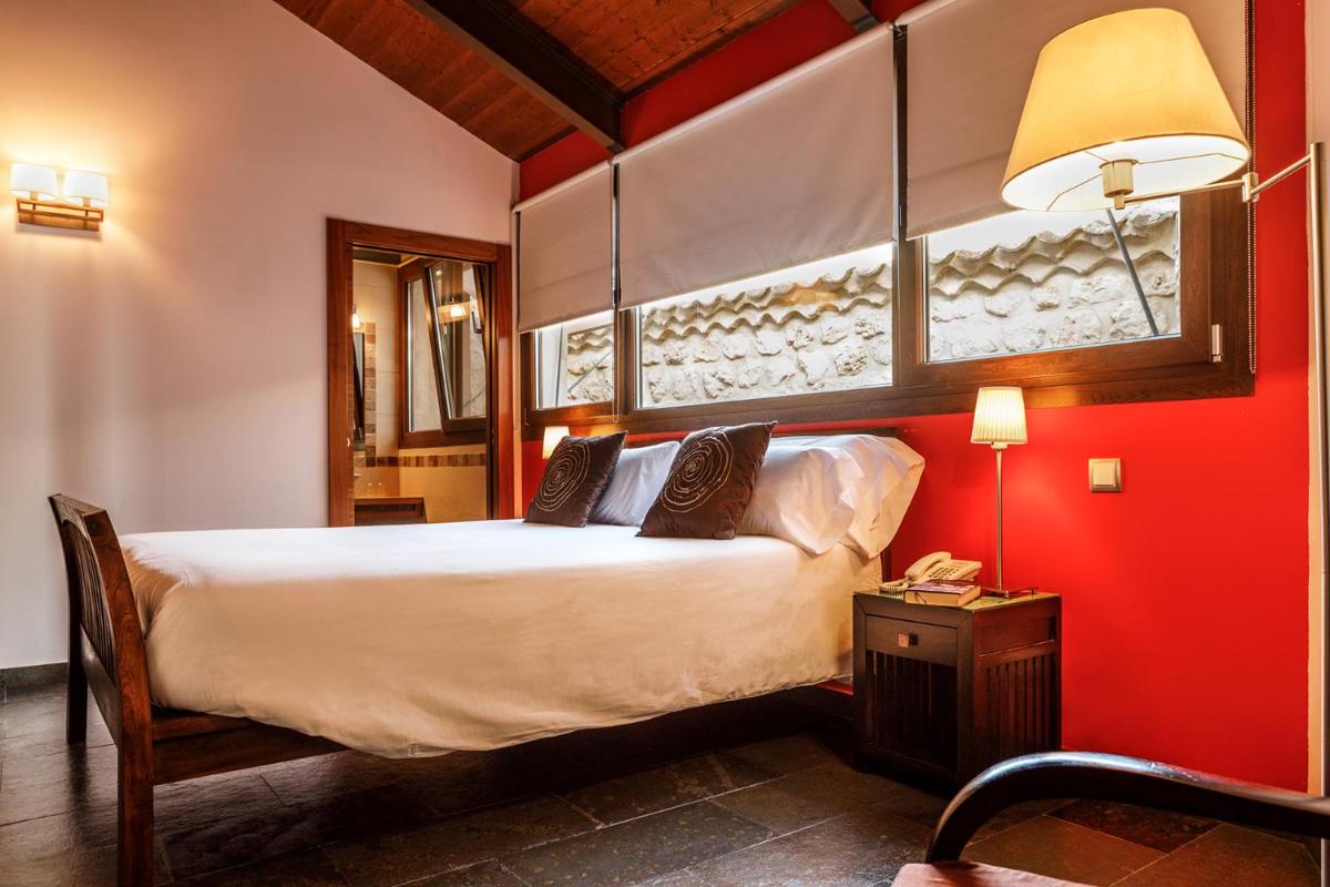 Cama o camas de una habitación en Eco Hotel Boutique & Spa Capitulo Trece - Adults Only