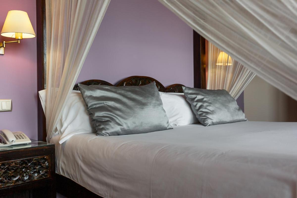 Cama o camas de una habitación en Eco Hotel Boutique & Spa Capitulo Trece - Adults Only