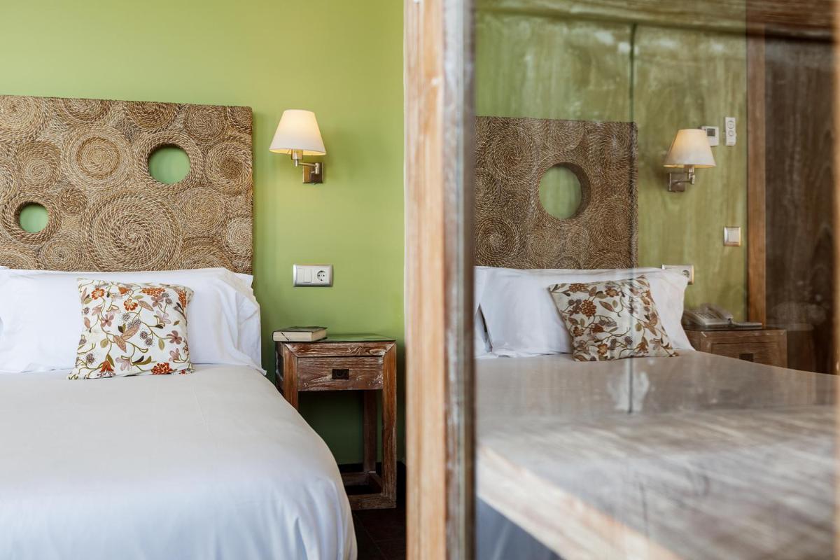 Cama o camas de una habitación en Eco Hotel Boutique & Spa Capitulo Trece - Adults Only
