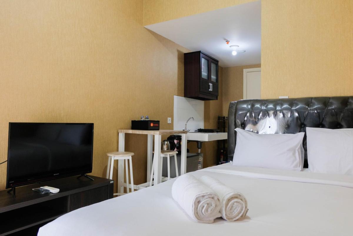 Luxury and Cozy Studio Apartment M-Town Residence By Travelio - Housity