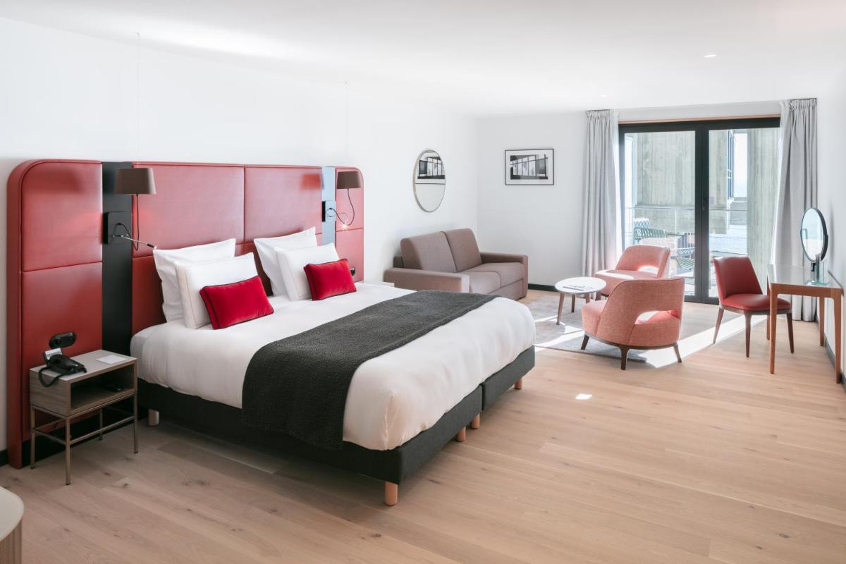 Un ou plusieurs lits dans un hébergement de l'établissement Sainte-Barbe Hotel & Spa Le Conquet - MGallery Collection