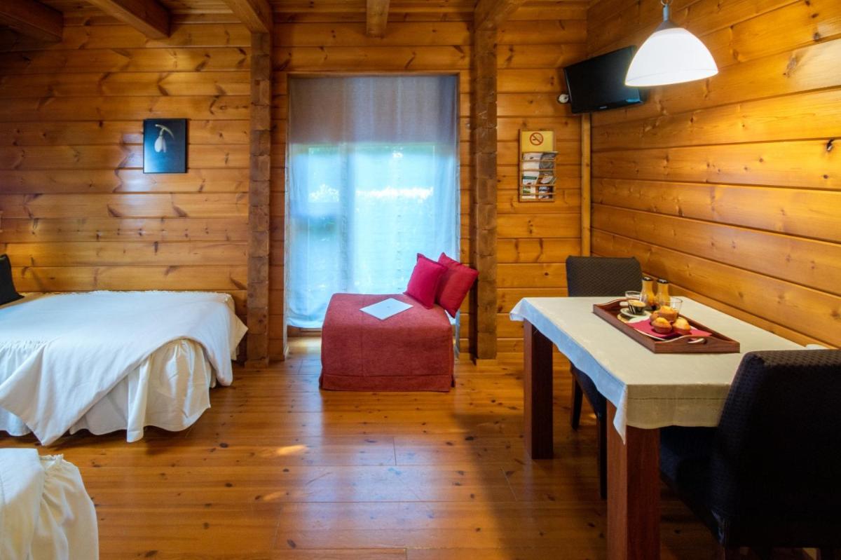 Cama o camas de una habitación en Hotel Somlom - ECO Friendly Montseny