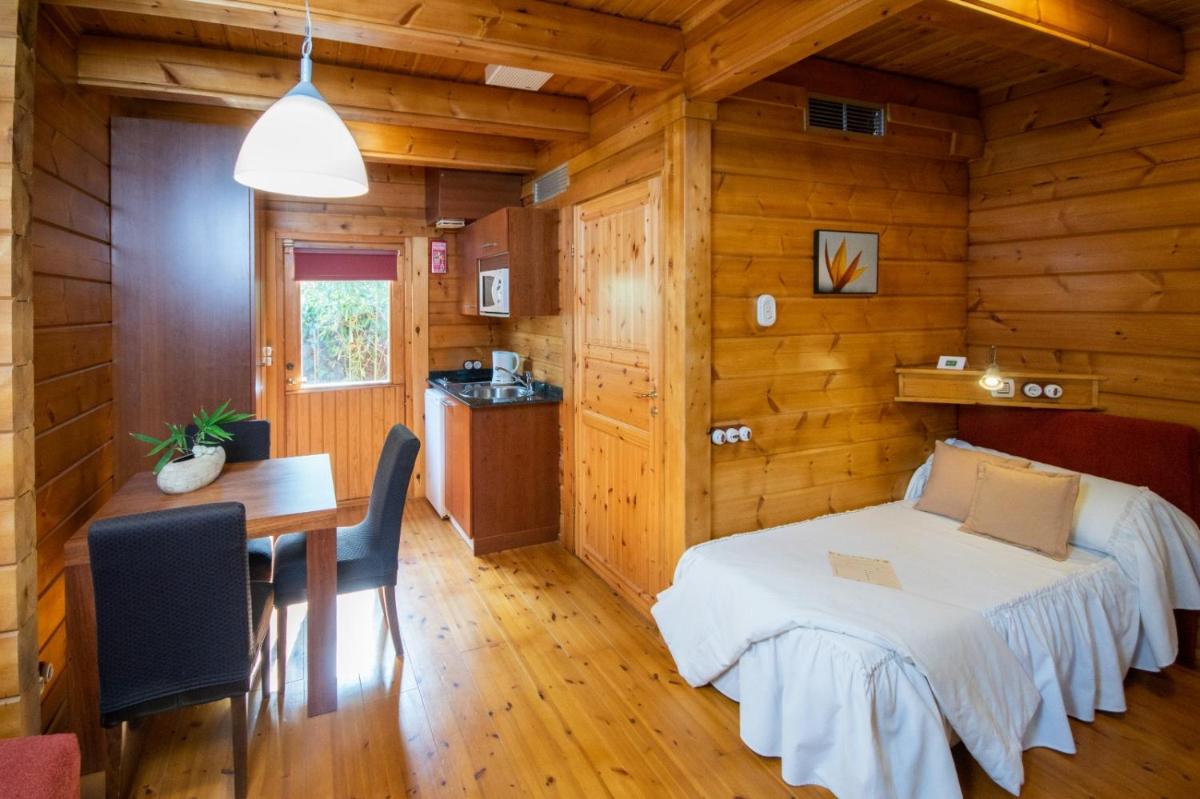 Cama o camas de una habitación en Hotel Somlom - ECO Friendly Montseny