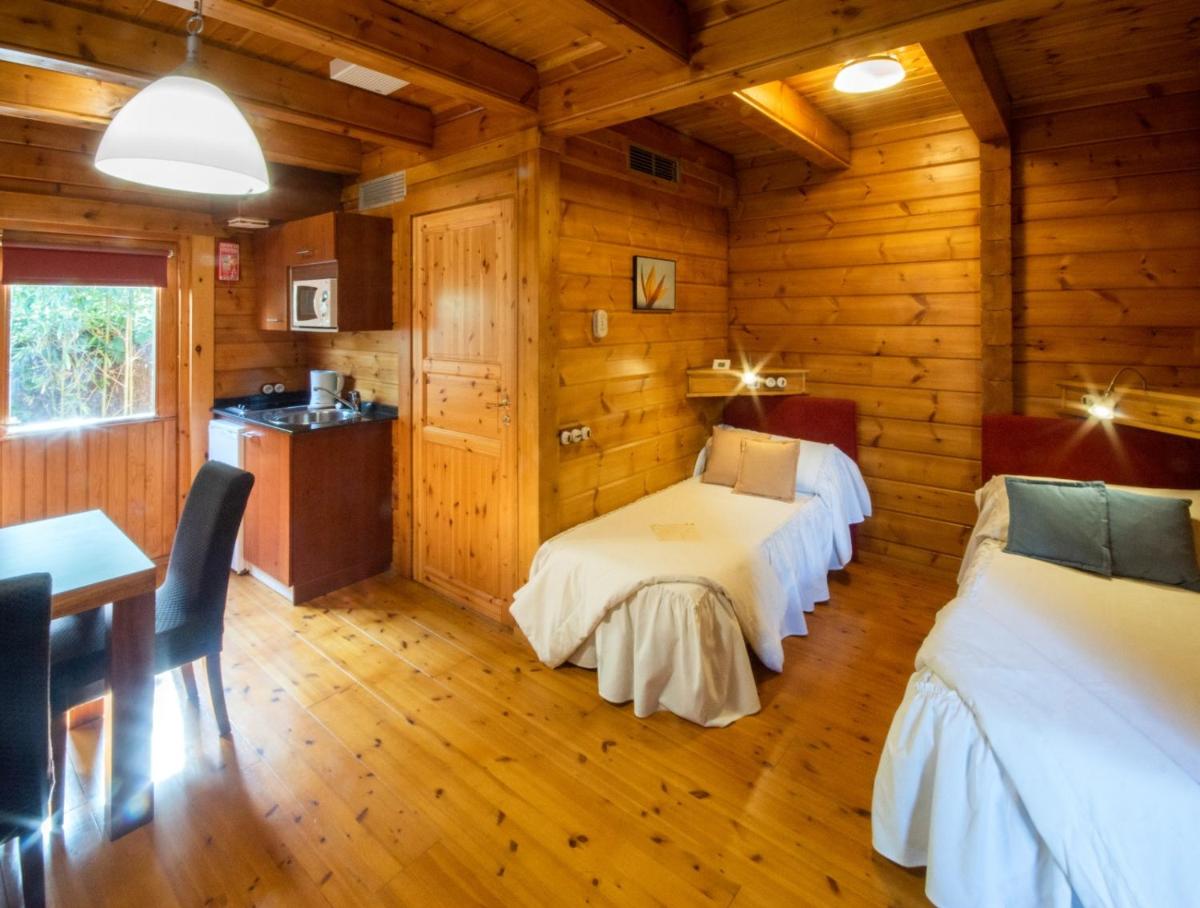 Cama o camas de una habitación en Hotel Somlom - ECO Friendly Montseny