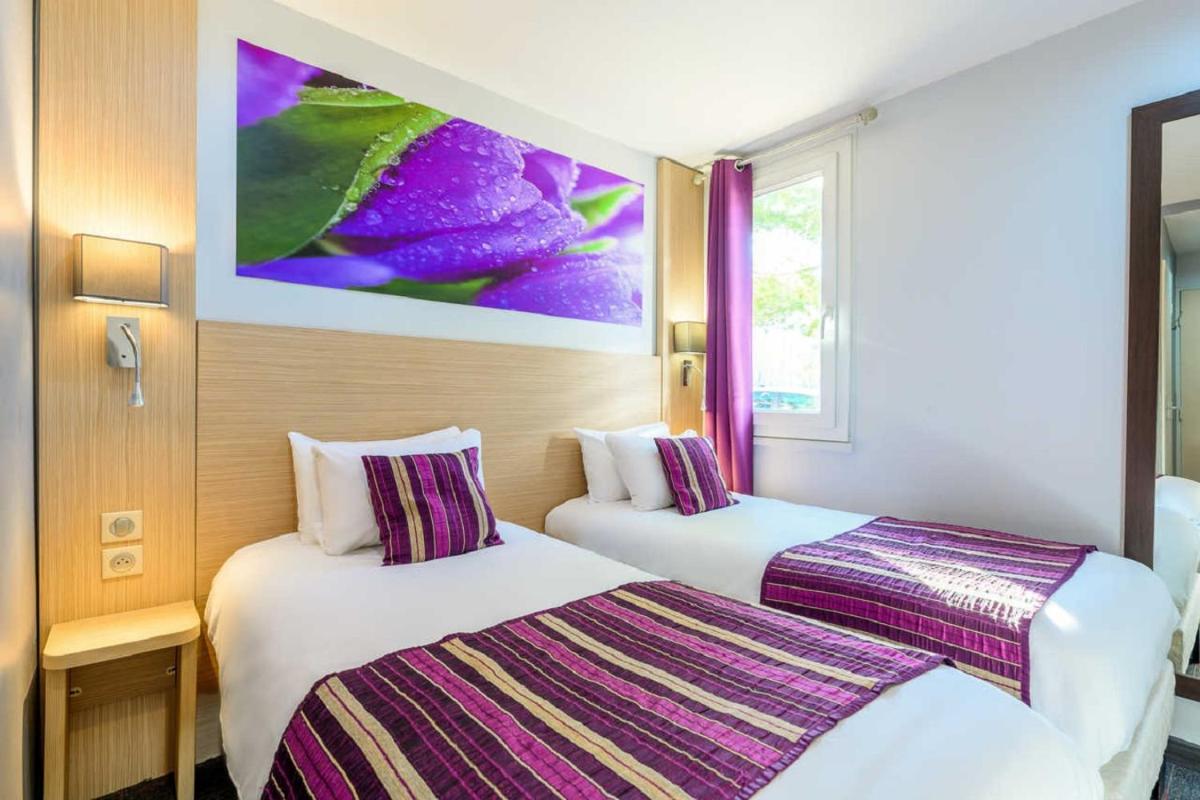 FH Confort Hotel Orléans Co'met - Housity