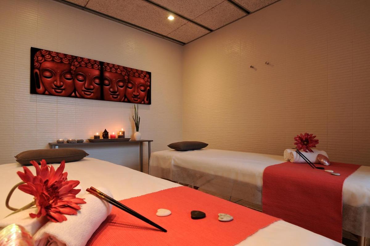 Cama o camas de una habitación en Magnolia Hotel - Adults Only