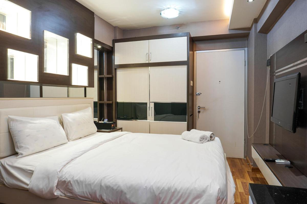 Comfortable Studio @ Green Bay Pluit Apartment By Travelio - Housity