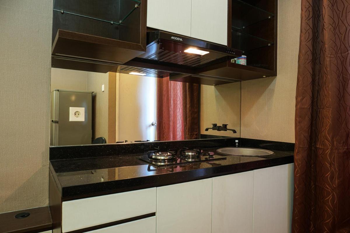 Comfortable Studio @ Green Bay Pluit Apartment By Travelio - Housity