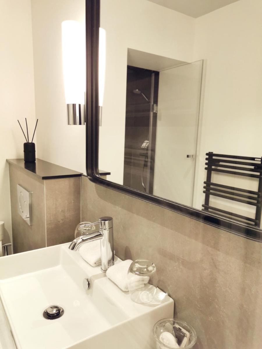 Salle de bains dans l'établissement Le Clos Saint-Martin Hôtel & Spa