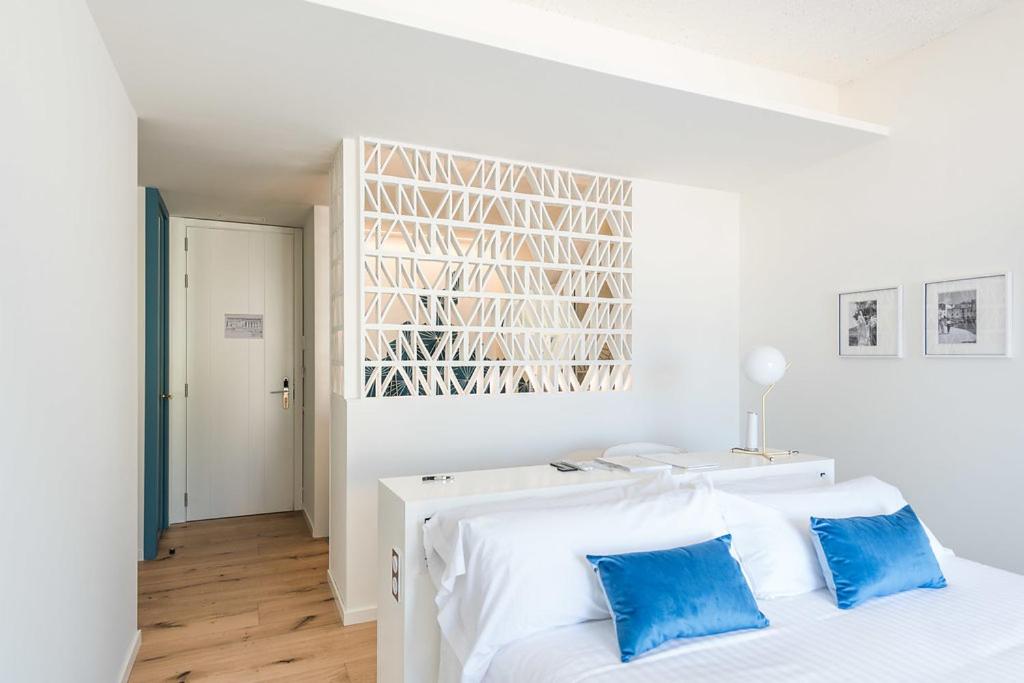 Cama o camas de una habitación en Boutique Hotel Villa Gala by Fimedhotels